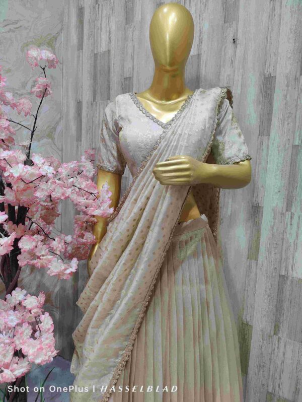 Elegant Cream Organza lehenga with Sequin Detailing