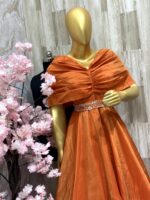 Elegant Burnt Orange Gown with Draped Shoulder and Embellished Waist