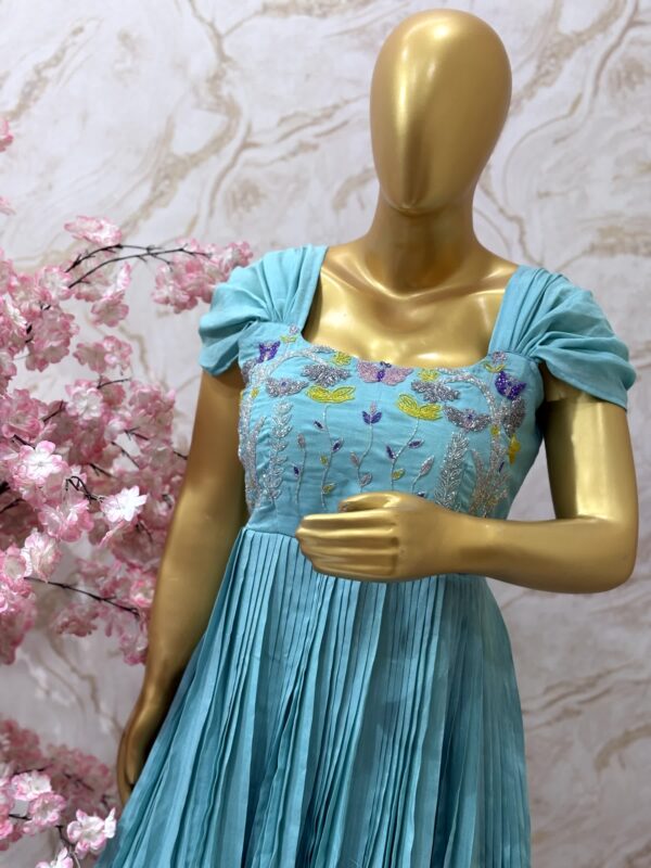 Sky Blue Pleated Gown with Pastel Floral Embroidery
