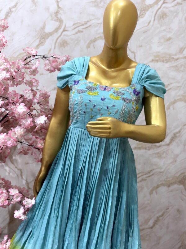 Sky Blue Pleated Gown with Pastel Floral Embroidery