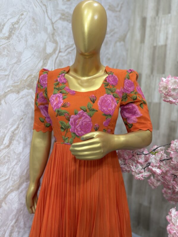 Orange Georgette Gown with Pink Floral Elegance