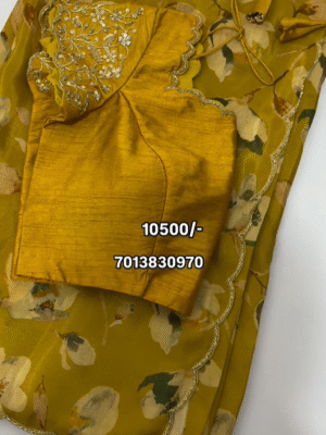 Exclusive designer pure tissue floral saree paired with beautiful maggam work blouse