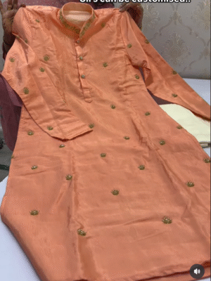 kurta having beautiful maggam work paired with cream clr pijama