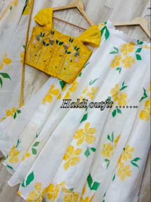 Exclusive designer floral skirt having all over sequence work paired up with beautiful maggam work blouse and self dupatta