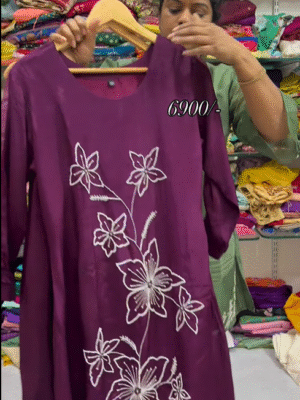 Exclusive pure crepe tunic with beautiful pearl work paired up with straight cut pant