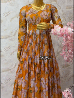 Exclusive designer floral long gown with beautiful maggam work on yoke part