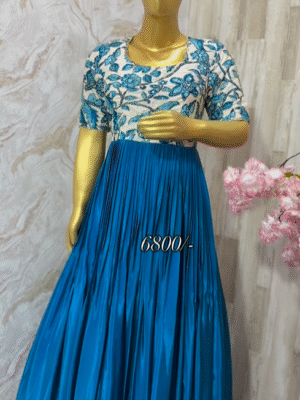 Exclusive designer Kalamkari long gown with beautiful maggam highlights and with heavy flare …..