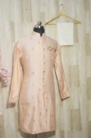 Peach Silk Kurta with Subtle Golden Motifs and Brooch