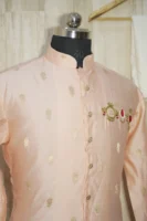 Peach Silk Kurta with Subtle Golden Motifs and Brooch