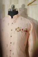 Peach Silk Kurta with Subtle Golden Motifs and Brooch