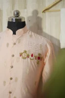 Peach Silk Kurta with Subtle Golden Motifs and Brooch