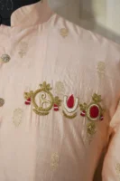 Peach Silk Kurta with Subtle Golden Motifs and Brooch