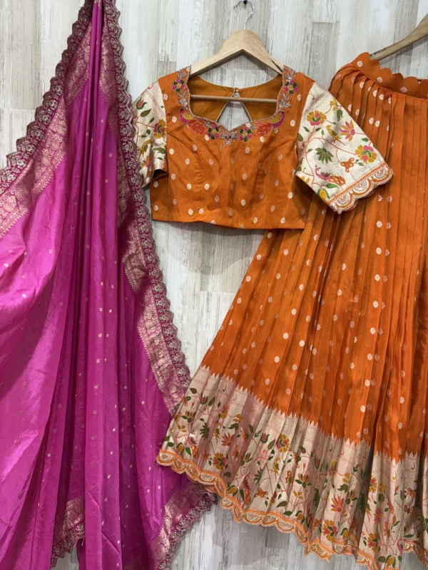 Pure tissue pithani lehenga paired with maggam work blouse and matching dupatta