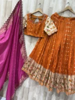 Pure tissue pithani lehenga paired with maggam work blouse and matching dupatta