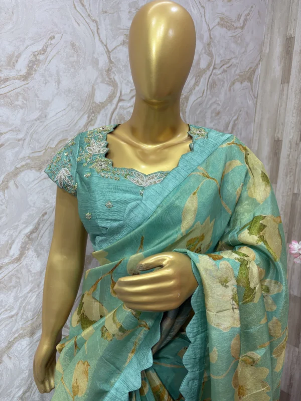 Floral tissue saree paired with beautiful maggam work blouse