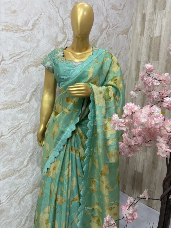 Floral tissue saree paired with beautiful maggam work blouse