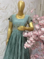 Crepe silk long gown having beautiful maggam worn on yoke part