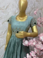 Crepe silk long gown having beautiful maggam worn on yoke part