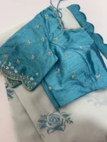 Pure georgette saree having pretty scalap border paired with maggam work blouse