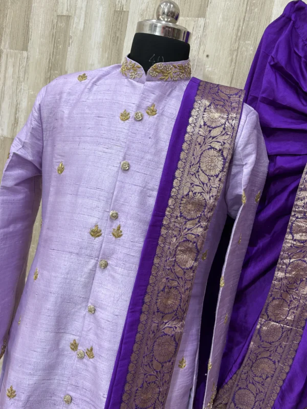 Pure rawsilk sherwani with beautiful maggam work paired with matching dhoti & kanduva