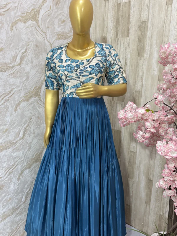 Kalamkari long gown with beautiful maggam highlights and with heavy flare