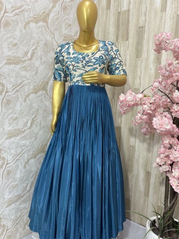 Kalamkari long gown with beautiful maggam highlights and with heavy flare
