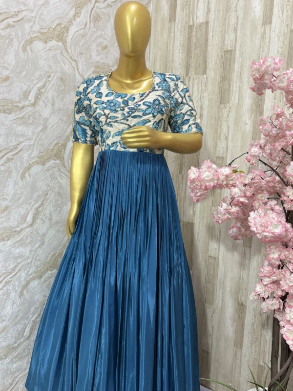 Kalamkari long gown with beautiful maggam highlights and with heavy flare