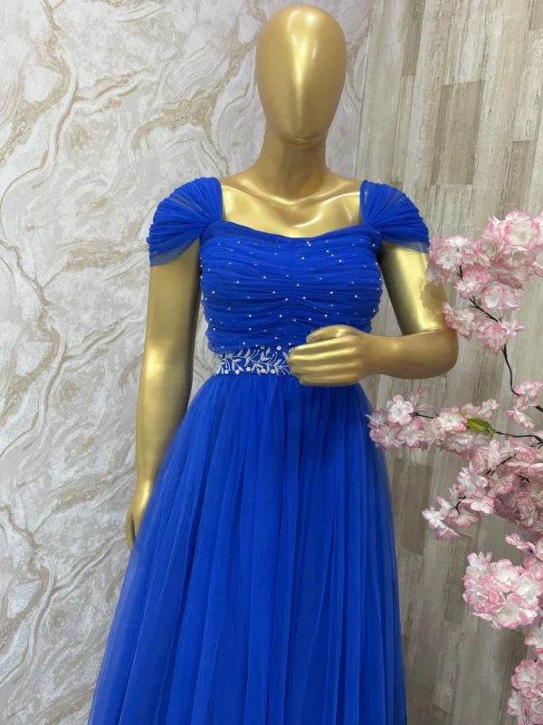 Designer long gown with maggam work yoke and waist belt