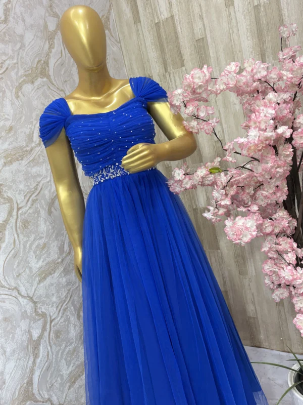 Designer long gown with maggam work yoke and waist belt