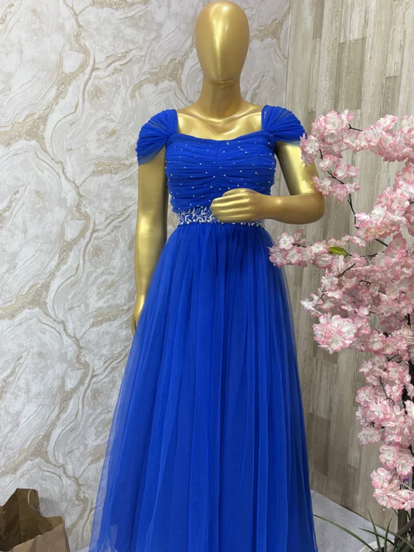 Designer long gown with maggam work yoke and waist belt