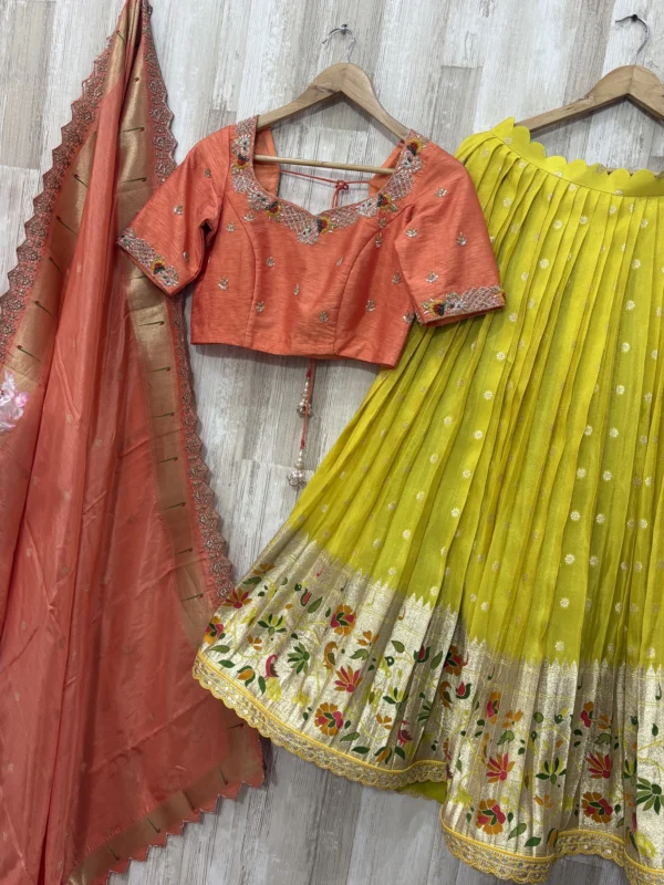 Tissue pithani lehenga paired up with beautiful maggam work blouse & muniya dupatta