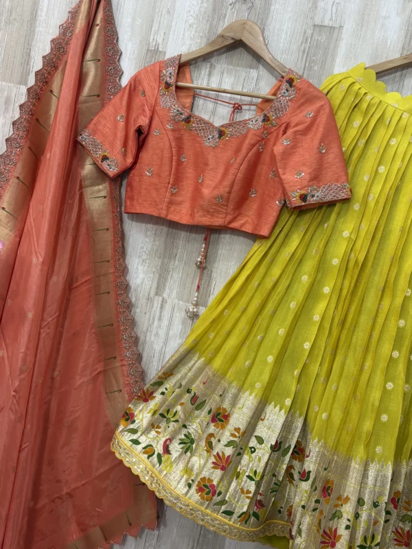 Tissue pithani lehenga paired up with beautiful maggam work blouse & muniya dupatta