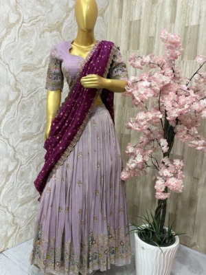 Kalamkari tissue lehenga set paired up with bandhini silk cut work dupatta