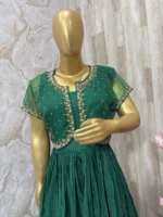 Long gown with heavy flare paired with beautiful maggam work jacket