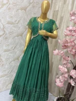 Long gown with heavy flare paired with beautiful maggam work jacket