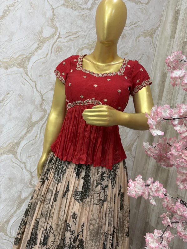 Floral tissue skirt paired with beautiful maggam work peplum blouse