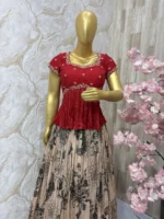 Floral tissue skirt paired with beautiful maggam work peplum blouse