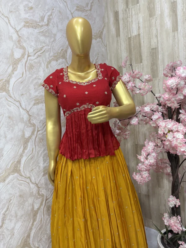 Maggam work peplum top paired with tissue skirt