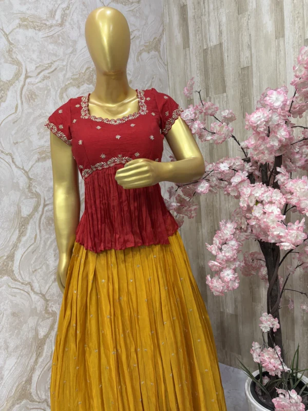 Maggam work peplum top paired with tissue skirt