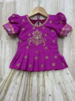 Tissue lehenga with pattu border paired with beautiful maggam work blouse