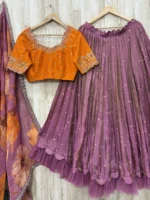 Tissue lehenga with beautiful maggam work blouse and dupatta