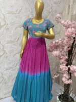 Dual shade long gown with floral yoke part and heavy maggam work