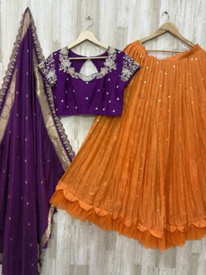 Tissue lehenga paired with beautiful maggam work & munita dupatta