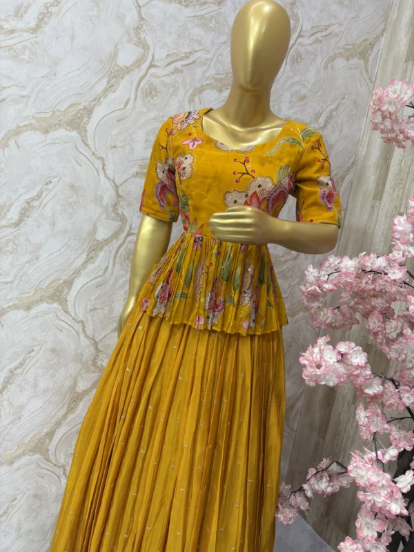 Floral top with self colour tissue skirt having all over sequin bootis