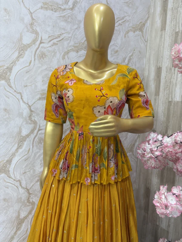 Floral top with self colour tissue skirt having all over sequin bootis