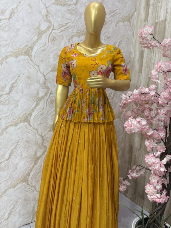 Floral top with self colour tissue skirt having all over sequin bootis