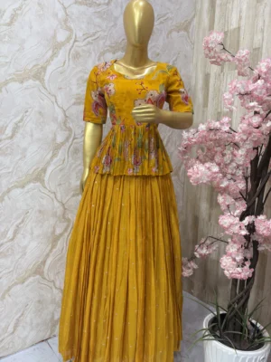 Floral top with self colour tissue skirt having all over sequin bootis