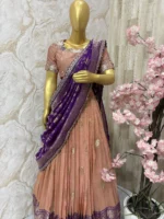 Tissue lehenga with beautiful pattu border paired up with maggam work blouse & rich dupatta