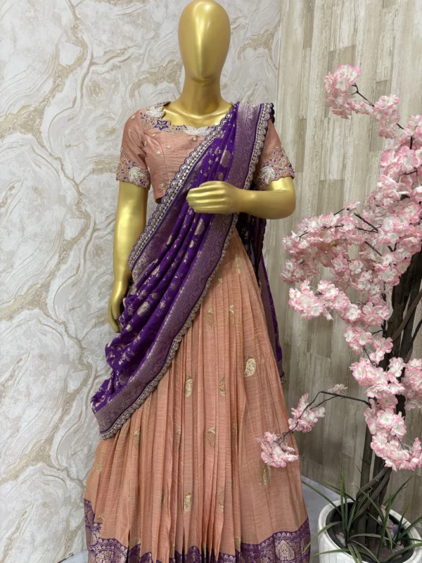 Tissue lehenga with beautiful pattu border paired up with maggam work blouse & rich dupatta