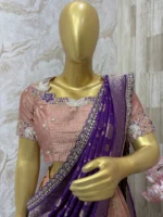 Tissue lehenga with beautiful pattu border paired up with maggam work blouse & rich dupatta